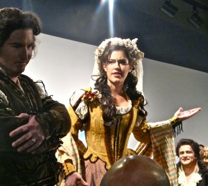 Angela Theis (center, as Zerlina), Carl Erikson (left, as Musetto), and Brad Pitser (lower right, as Don Giovanni), performed from Don Giovanni