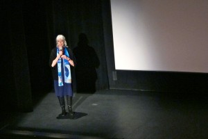 Margaret Thomas introducing the Saturday night show