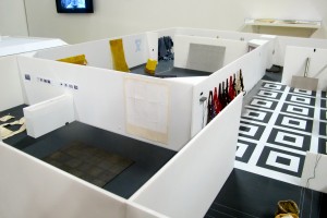 The original show is presented in microcosmic form at the start of the exhibit, with a miniature replica of the gallery spaces