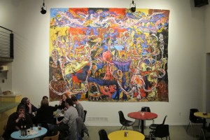 "Destruction and Delight" strikes balance on every level, from the title, to the composition, and even the interplay with the cafe&squot;s colored tabletops