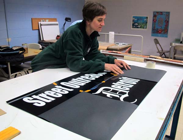 Co-owner Kinga Osz-Kemp discusses layout options on a project in progress.