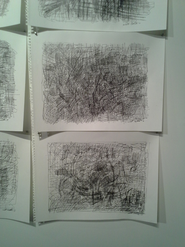 Detail from a wall of various drawings.