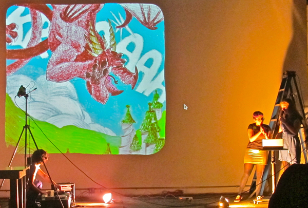 Emma Rand and company (including Jen David on keyboard), narrating a "Choose Your Own Adventure" that you can play along here.