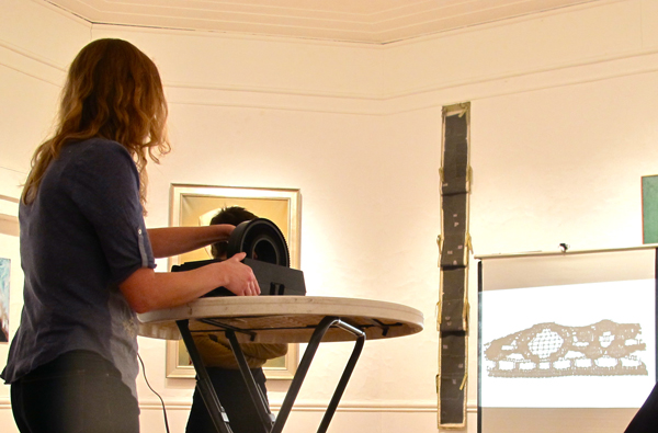 Laura Beyer preparing for her reading.