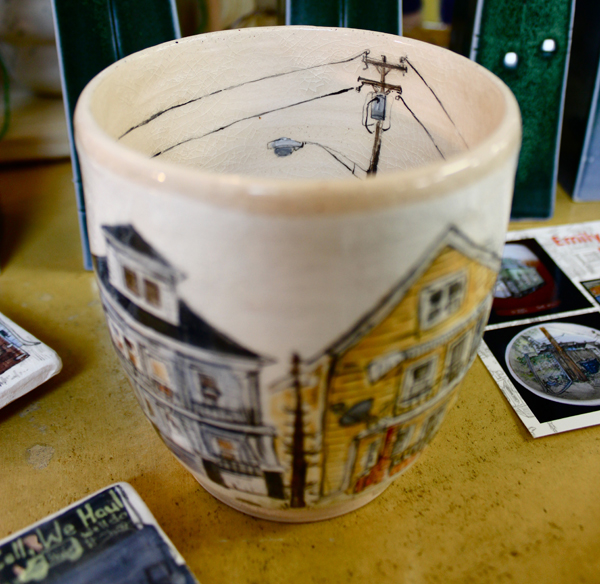 Wood's work has become increasingly detailed, with utility poles, pylons, and scrap wood (her new signature) decorating interior surfaces.