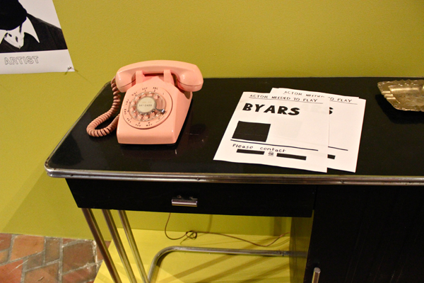 During the opening, a visitor was seen speaking on the phone...with whom?