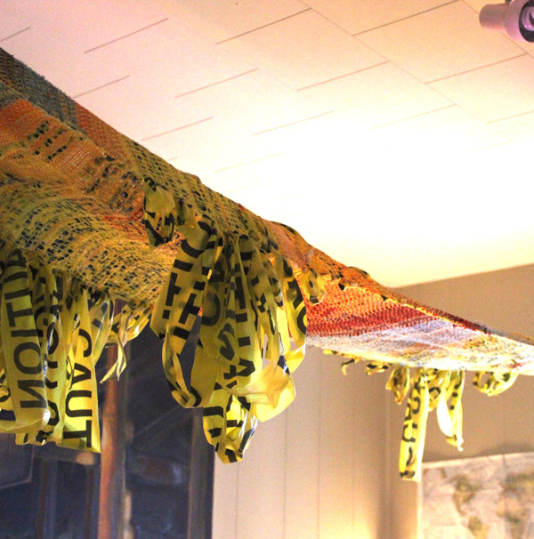 One of Schubatis' recent works, featured at the Red Bull House of Art, which incorporates experimental materials, such as caution tape.