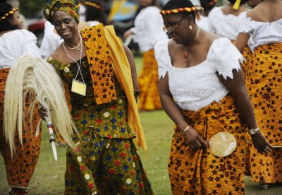 Chi Ezekwueche (with yellow tag and scarf) - Founder of the Pan African Festival of Georgia festival
