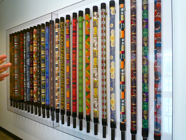 The piece utilizes fabrics sourced locally and internationally, to emphasize the blending of cultures.