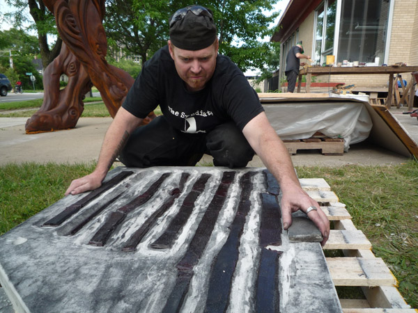 Casey Westbrook surveys a mold-in-progress.