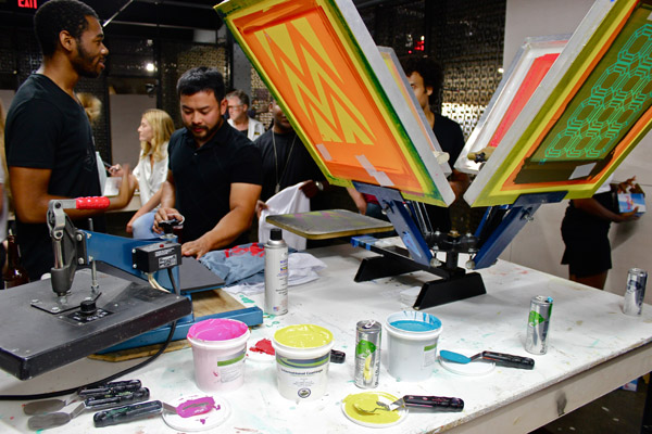 The opening featured screen-printing, live band, and break-dancing, plus all the Red Bull you can drink.
