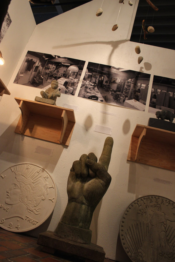 Statuary carved out of old sandstone foundations, salvaged from demolition sites.