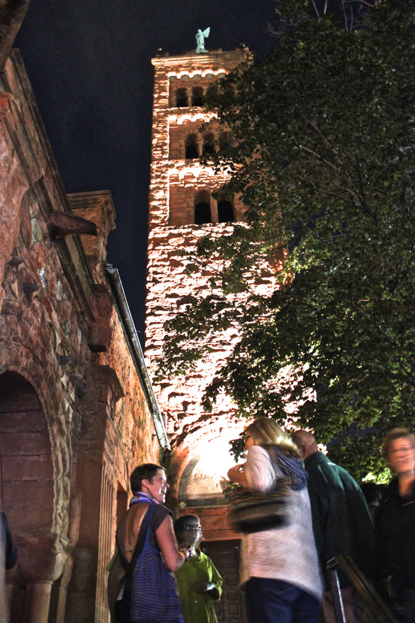 Megan Heeres (left) beneath her interactive bell tower.