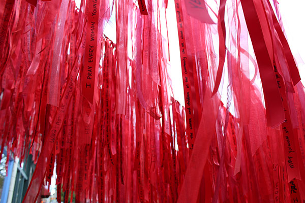 Red Cord Community offers passers-by the option of creating a prayer in defense and healing of women who have survived prostitution, trafficking, addiction, and abuse.