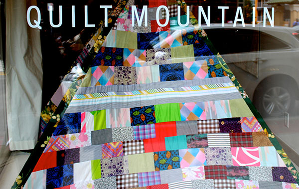 Quilt Mountain, the showpiece in a beautiful series of quilted works at Have Company on Division Street.