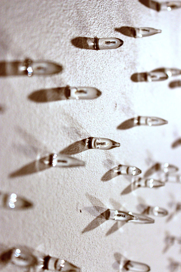 Tengo Hambre ("I&squot;m Hungry"), an incredibly moving minimalist piece by Maximo Gonzalez, with hundreds of grains of rice inscribed with the title of the piece.