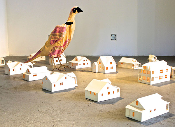The detailed paper homes are for sale individually: $30 for whole, and $20 for partially destroyed ones.