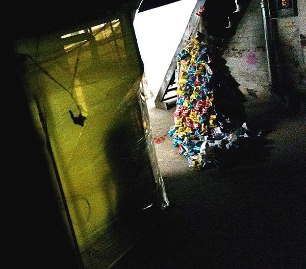 The spooky scene across the street, SUPER PIE DESANTO'S COMMENTARY ON SPATIAL USE RELATIVE TO ECONOMIC INSTABILITY.