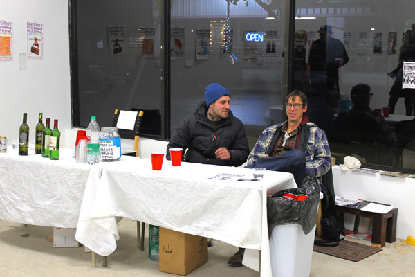 Buzzolini (left) holds court with Hughes of Public Pool (right).