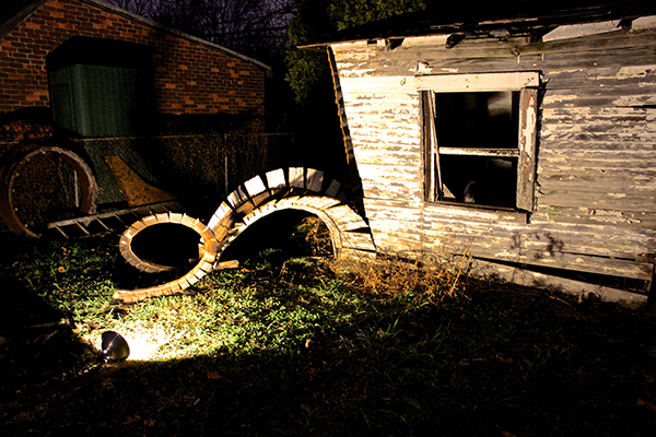 A corner of the garage tentacles into the yard, in this installation by Robbie Rowlands.