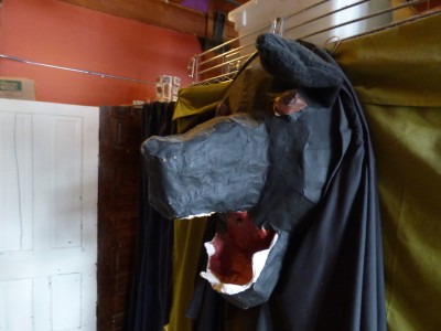 A paper mache Black Dog