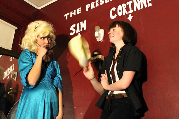 Here in the "Present Day," a performance piece by Samantha Mattmaker (right) and Corinne Donly (left).
