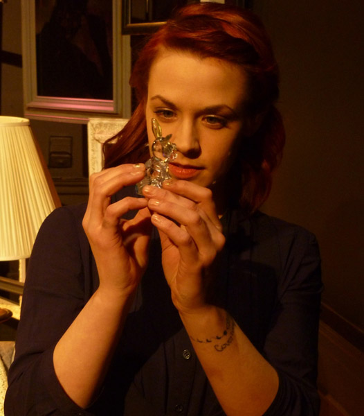 Laura He as Laura. Photo courtesy of Puzzle Piece Theatre.